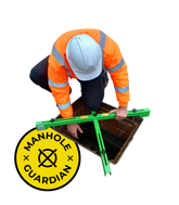 Manhole Guardian in place over an open manhole