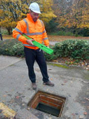 Carrying the Manhole Guardian in its folded form