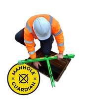 Manhole Guardian in place over an open manhole