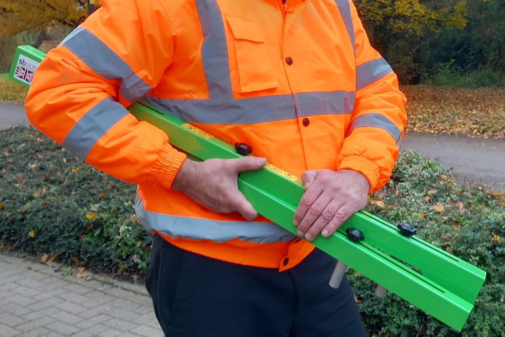 Manhole Guardian safety frame folded for storage in a vehicle