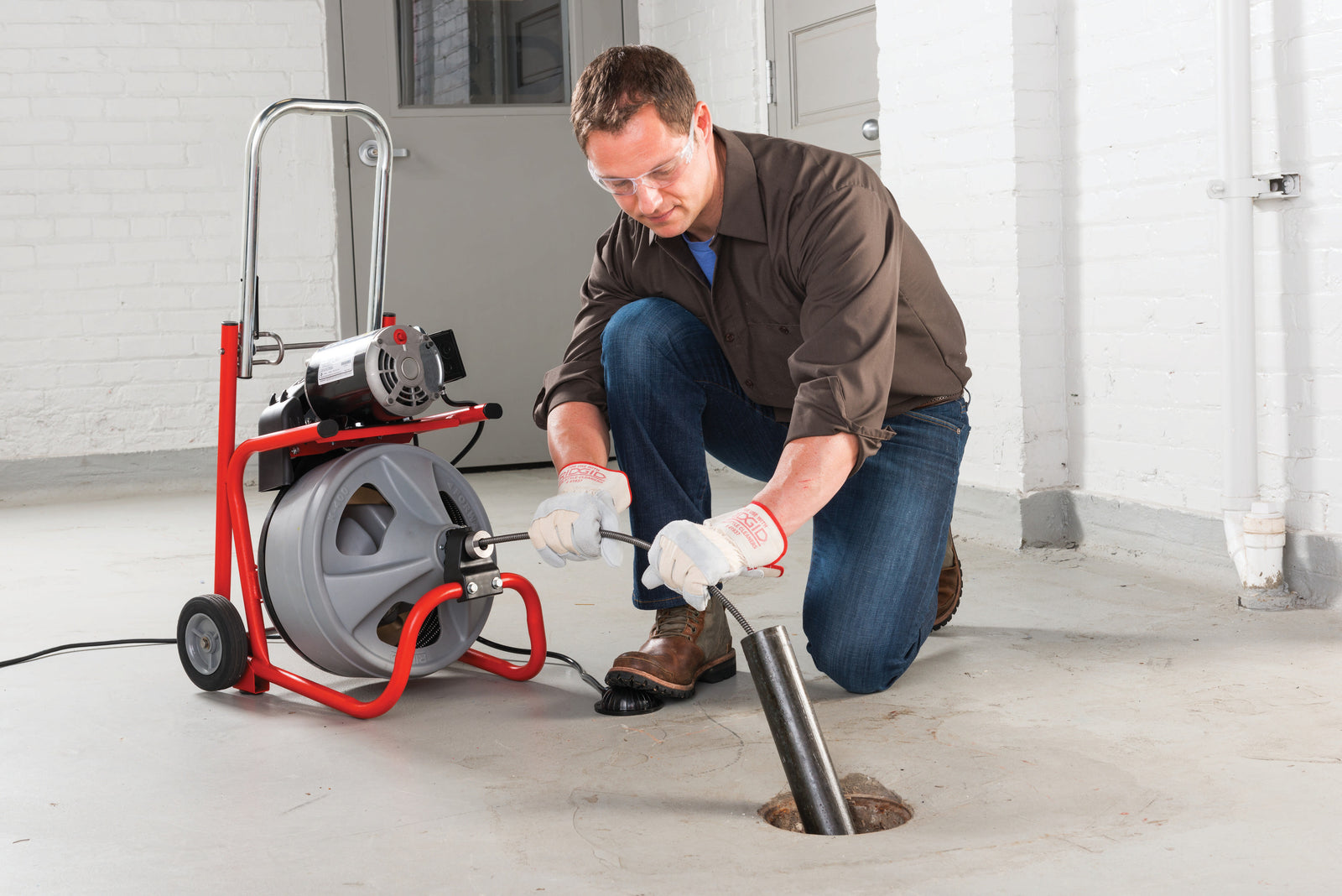 RIDGID K-400 Machine with RIDGID Drain Cleaning Gloves – AUTOFEED – C-45 IW 1⁄2" x 75' (12 mm x 23 m)  Solid Core (Integral Wound) Cable – T-260 Tool Set – product view | 28103